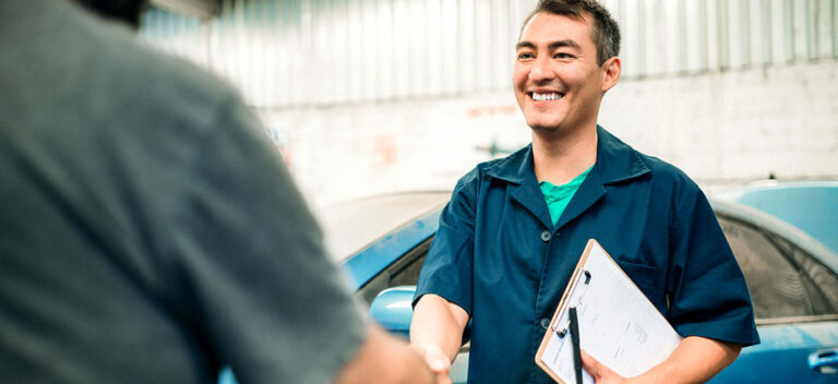 a happy businessman who has organised his business finances
