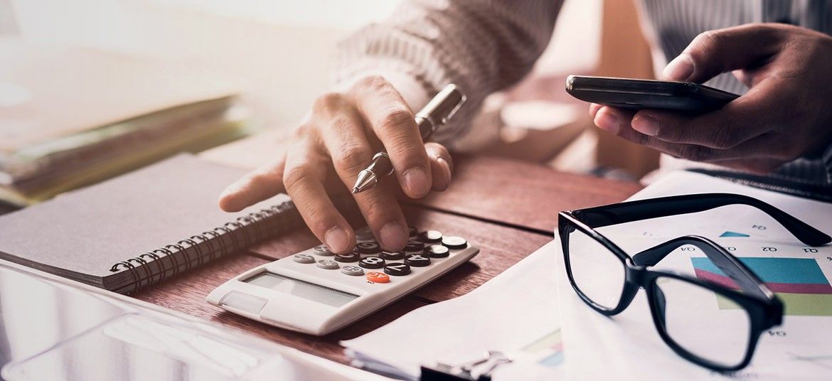 person at desk managing accounts receivable