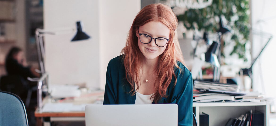 A person looking at a computer finding choices for accounting software