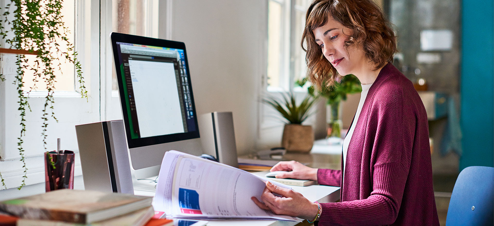 woman at desk choosing between debt finance and equity finance