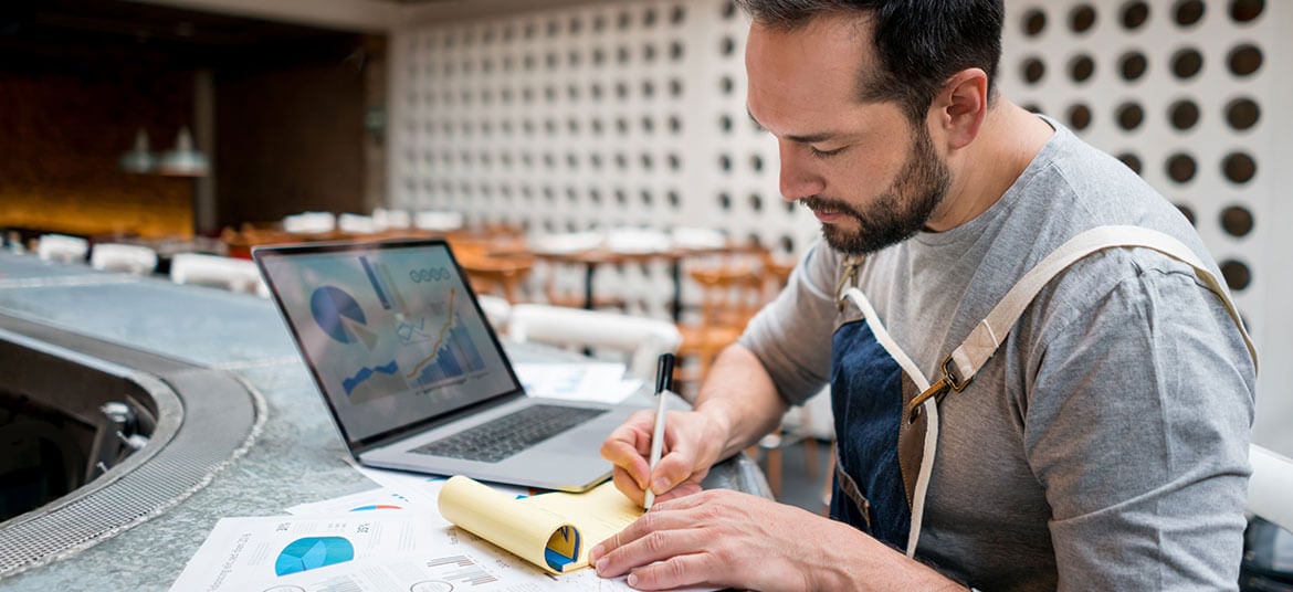 man analysing financial key performance indicators