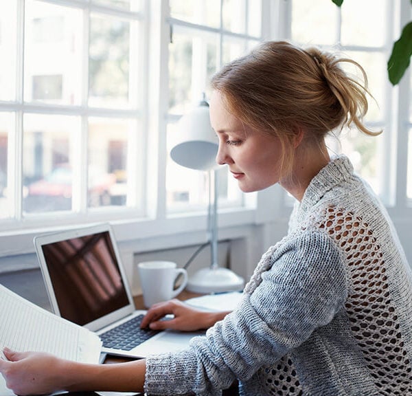 Small business owner reviewing tax details