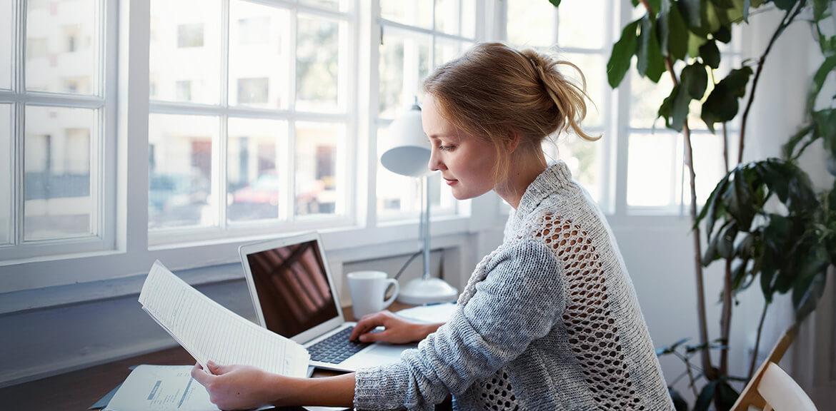 Small business owner reviewing tax details
