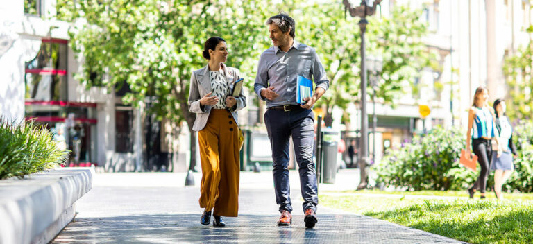 Two colleagues in one of their walking meetings