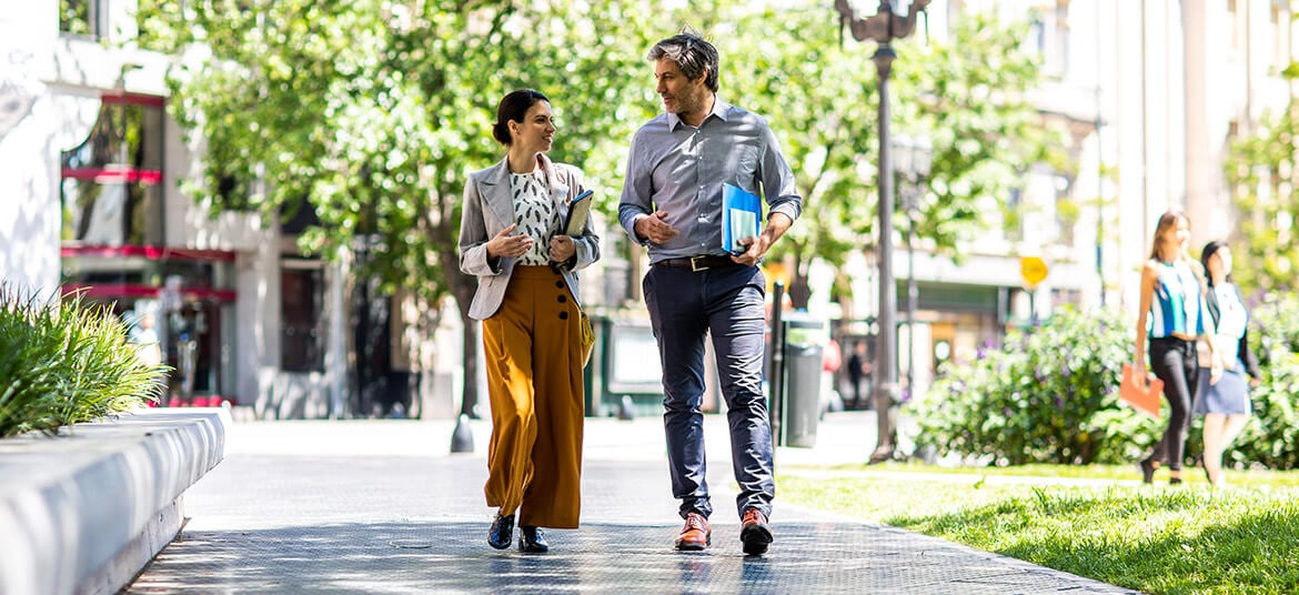 Two colleagues in one of their walking meetings